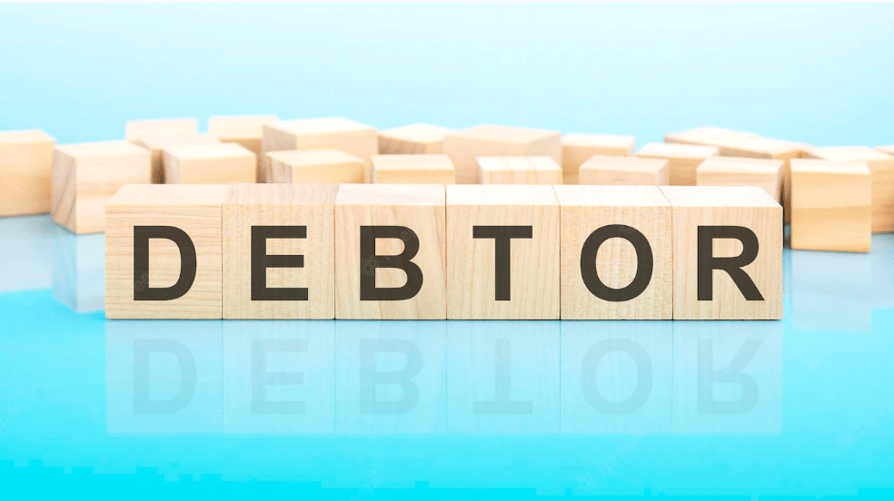 Debtor on Wooden Cubes